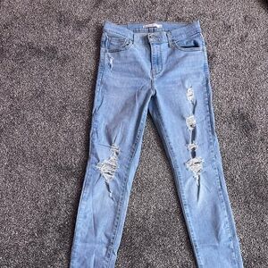 Levi 720 High Rise Super Skinny Light Blue Ripped Jeans